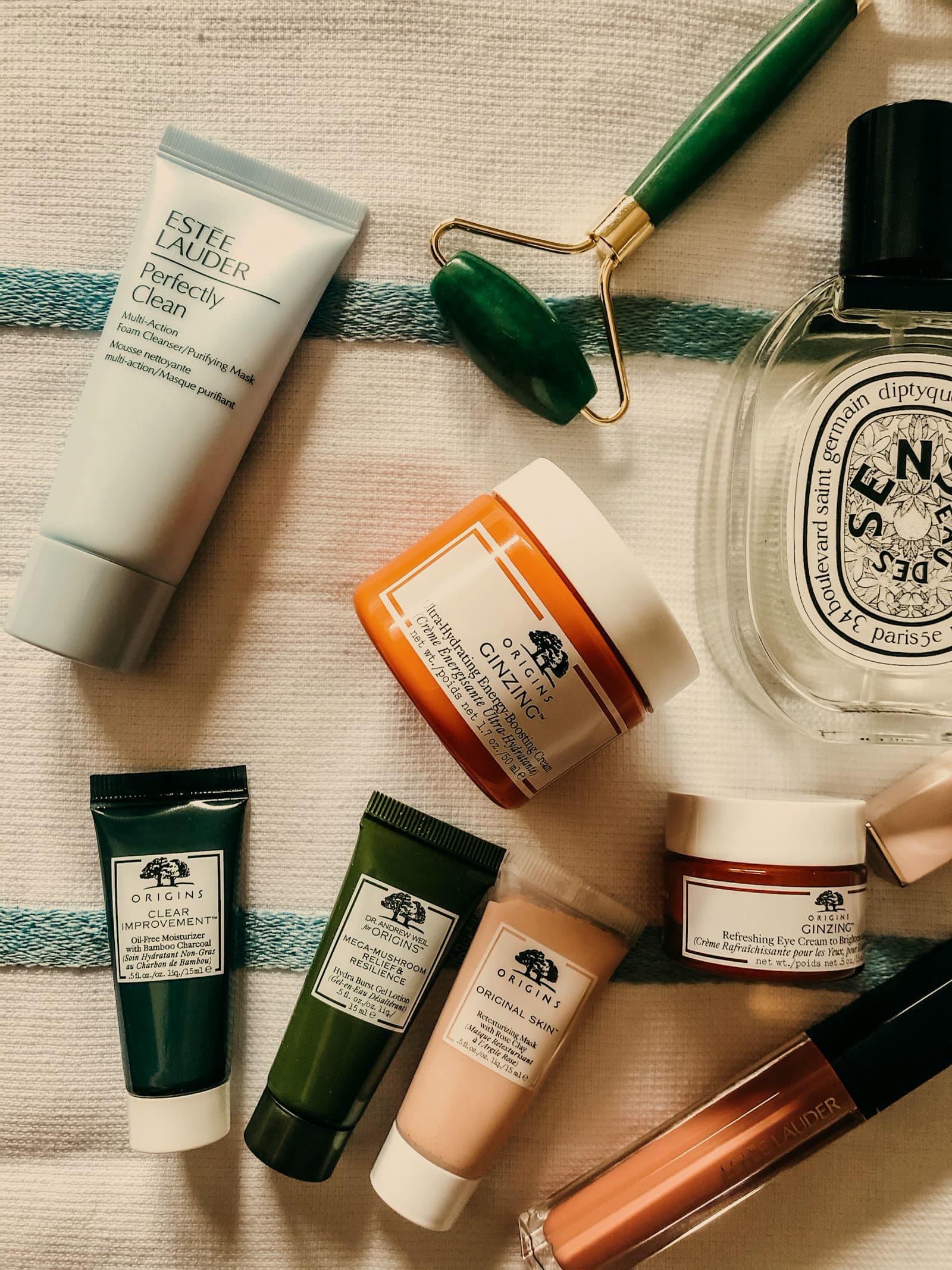 Care products laid out on linen