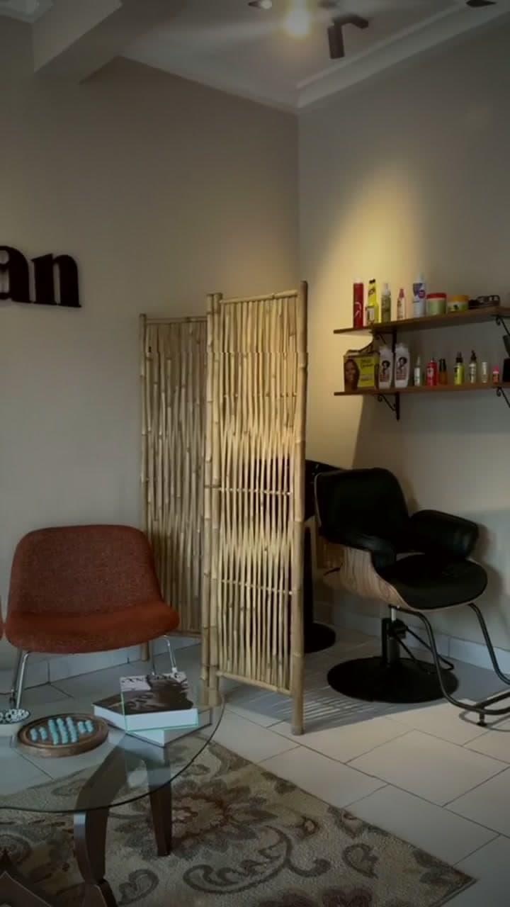 A bamboo screen separating the treatment area